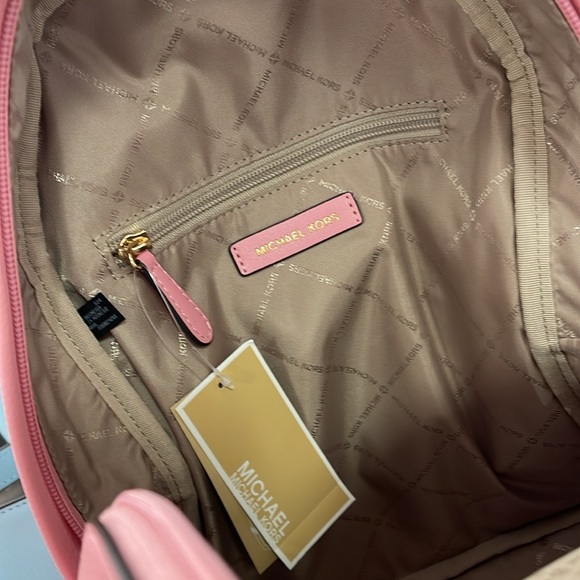 MICHAEL KORS 
Maisie Medium Pebbled Leather 2-in-1 Backpack
Carnation 
NWT - Picture 12 of 16